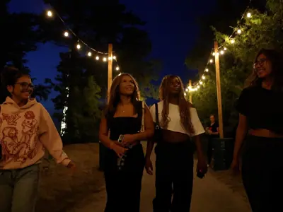 Illuminated trees and pathways lead from music festival grounds to Beach Area 2 in Wasaga Beach